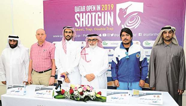 Qatar Open tournament director Abdullah Ali al-Mutawa al-Hammadi (third right) poses with other officials on the eve of the tournament.