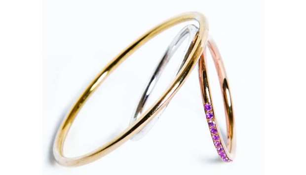 Wires in Gold ring in yellow, rose and white gold, pink sapphire.