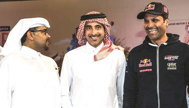 QMMF President Abdulrahman al-Mannai (L), HE Salah bin Ghanem bin Nasser al-Ali, Minister of Culture and Sports (C) and Qatar rallying ace Nasser Saleh al-Attiyah prior to yesterdayu2019s start.