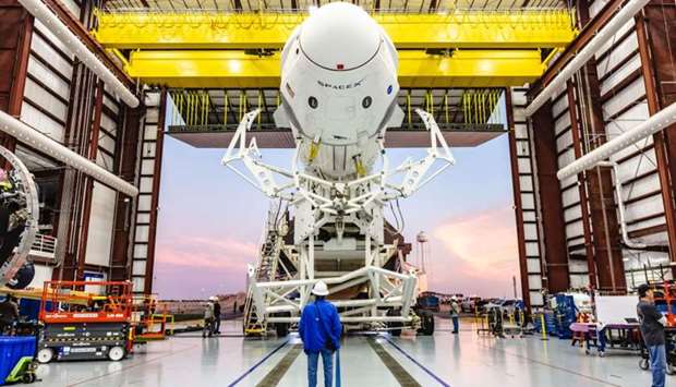 SpaceX Falcon 9 rocket with the companyu2019s Crew Dragon attached, rolling out of the companyu2019s hangar at NASA Kennedy Space Centeru2019s Launch Complex 39A, on January 29, 2019.