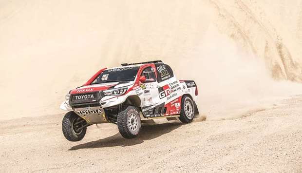 Nasser al-Attiyah powers his Toyota through the desert during the second day of the Manateq Qatar Cross-Country Rally yesterday.