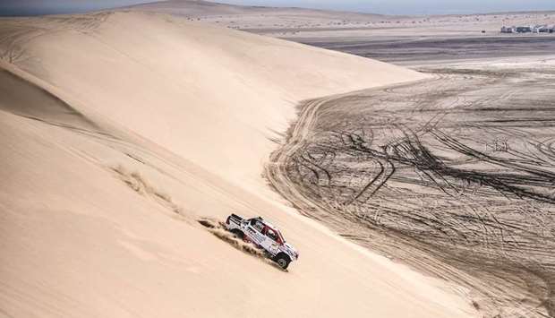 Nasser Saleh al-Attiyah and French co-driver Matthieu Baumel lead the Manateq Qatar Cross-Country Rally by 9min 52sec after the third round.