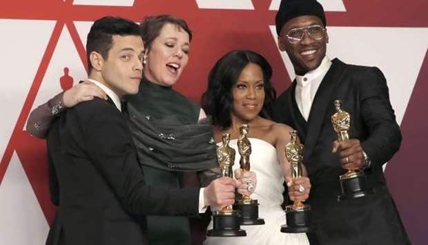 Best Actor Rami Malek, Best Actress Olivia Colman, Best Supporting Actress Regina King and Best Supporting Actor Mahershala Ali pose with their awards backstage