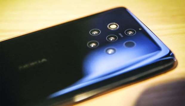 Five Carl Zeiss camera lenses adorn the rear case of a Nokia 9 PureView smartphone. HMD Global Oy, which produces consumer products under the Nokia name, showed off the Nokia 9 PureView at MWC Barcelona on Sunday.