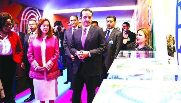 HE the Deputy Prime Minister and Minister of Foreign Affairs Sheikh Mohamed bin Abdulrahman al-Thani at the exhibition with other dignitaries.
