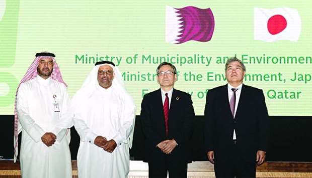 Officials of the Ministry of Municipality and Environment with the Vice-Minister for Global Environmental Affairs at Japan's Ministry of the Environment, Yasuo Takahashi, and Japanese ambassador to Qatar Seiichi Otsuka during the workshop.