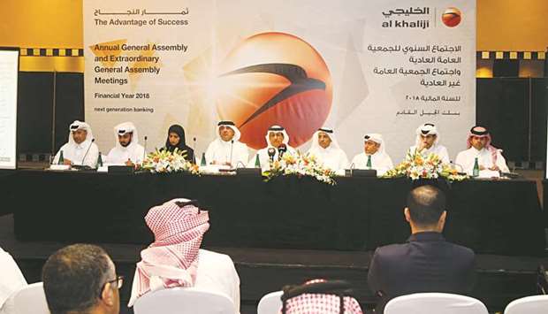 Al Khaliji chairman and managing director Sheikh Hamad bin Faisal bin Thani al-Thani with other directors at the banku2019s general shareholders meeting on Sunday.