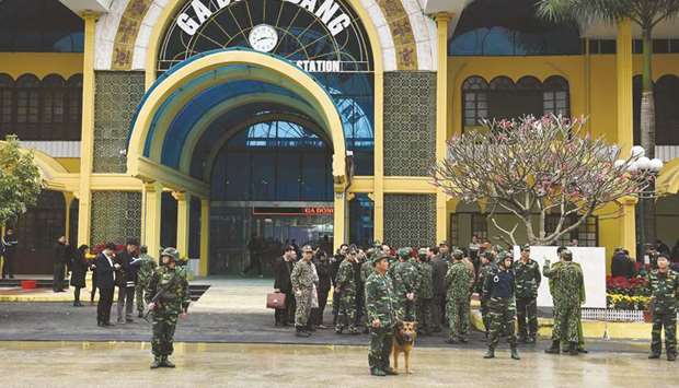Vietnamese soldiers stand guard near an entrance of the Dong Dang railway station, where North Korean leader Kim Jong-un is expected to arrive by train ahead of the second US-North Korea summit, in Lang Son yesterday.