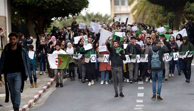 Algerian students protest on the main campus of the University of Algiers against ailing President Abdelaziz Bouteflika's bid for a fifth term