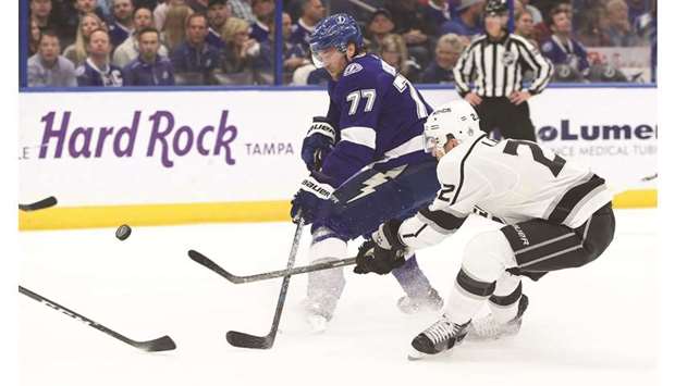 Tampa Bay Lightning defenseman Victor Hedman (77) skates with the puck as Los Angeles Kings center Trevor Lewis (22) defends during their NHL game on Monday. PICTURE: Kim Klement-USA TODAY Sports
