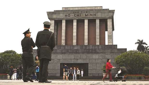 Vietnamese policemen stand guard at the Ho Chi Minh Mausoleum in Hanoi yesterday, ahead of the second US-North Korea summit.