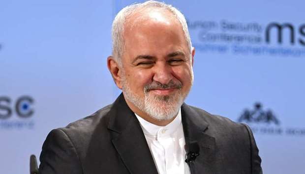 Iran's Foreign Minister Mohammad Javad Zarif smiles during the annual Munich Security Conference in Munich, Germany Feb. 17, 2019