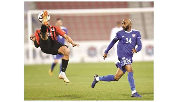 Al Shahaniau2019s Sultan al-Kuwari (right) in action against Al Rayyan during their QNB Stars League match at Al Arabi Stadium yesterday. PICTURE: Noushad Thekkayil