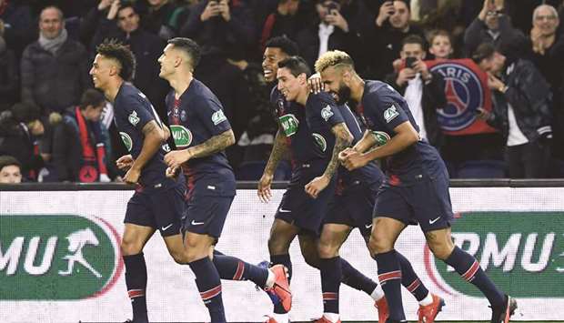 Paris Saint-Germainu2019s Angel Di Maria (second right) celebrates with teammates after scoring a goal during the French Cup quarter-finals against Dijon in Paris. (AFP)