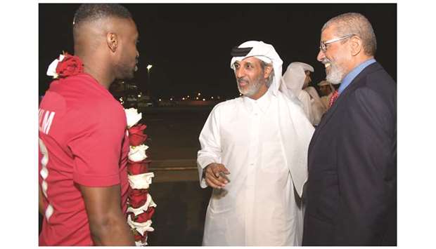 QFA President HE Sheikh Hamad bin Khalifa bin Ahmed al-Thani (right) at the teamu2019s arrival in Doha.