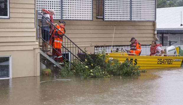 SES volunteers are seen rescuing residents in Rosslea, Townsville, Queensland, Australia