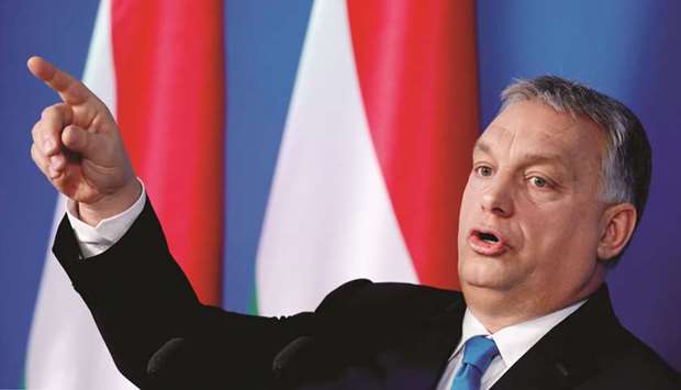 FILE PHOTO: Hungarian Prime Minister Viktor Orban gestures as he speaks during the weekly government news conference in Budapest, Hungary, January 10. To this day, resentment over the Treaty of Trianon fuels Hungarian nationalism and revisionism, particularly under the current government of Prime Minister Viktor Orban.
