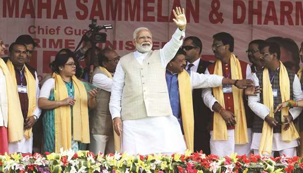 Prime Minister Narendra Modi waves during a public meeting in Thakurnagar yesterday.