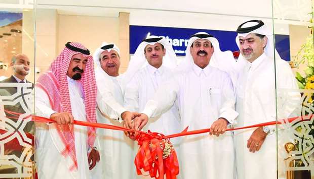 Sheikh Dr Khalid and prominent Qatari entrepreneurs among other dignitaries during the opening of QIIB's new branch at Ezdan Mall-Al Wakra.