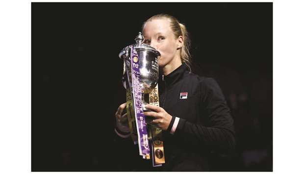 Netherlandsu2019 Kiki Bertens poses with the trophy after beating Croatiau2019s Donna Vekic in the St Petersburg Ladies Trophy finalyesterday. Bertens isexpected to play in QatarTotal Open 2019, which starts on February 11. (Reuters)