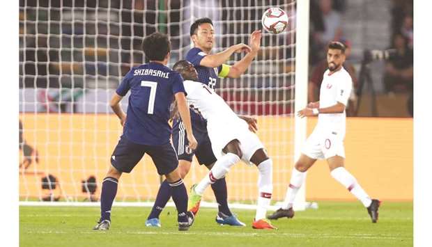 Qataru2019s Almoez Ali (second from left) prepares to score a goal during the AFC Asian Cup final against Japan in Abu Dhabi on Friday. This bicycle-kick stunner has been nominated for the best goal of the tournament.