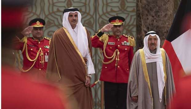 His Highness the Amir Sheikh Tamim bin Hamad Al-Thani accompanied by Amir of Kuwait Sheikh Sabah Al-Ahmad Al-Jaber Al-Sabah during the ceremonial reception at at Bayan Palace