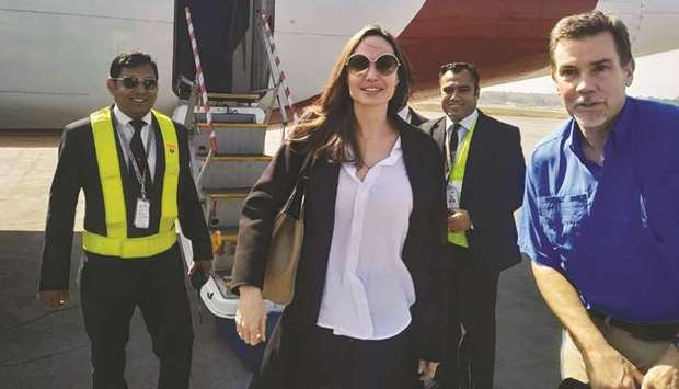 US actress and humanitarian Angelina Jolie, a special envoy for the United Nations High Commissioner for Refugees (UNHCR), arrives at the airport in Coxu2019s Bazar in southern Bangladesh yesterday.