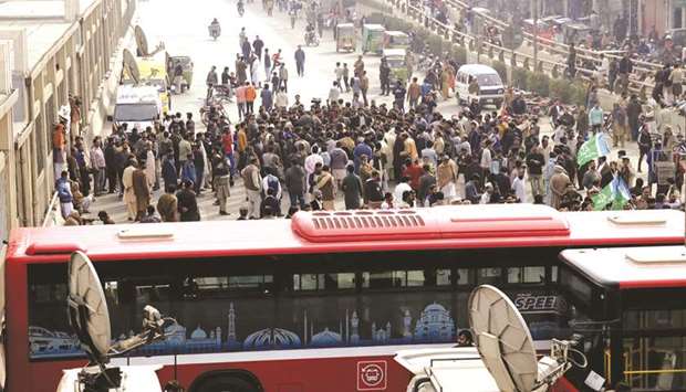 In this picture taken on January 20, mourners block a road in protest in Lahore, after members of a family were killed by police in an u2018encounteru2019 in Sahiwal.