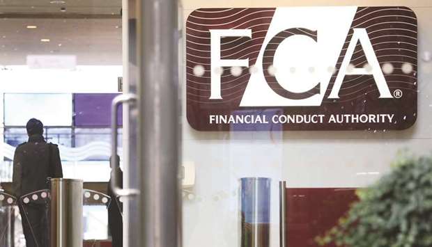 A logo is seen at the headquarters of the Financial Conduct Authority (FCA) in the Canary Wharf business district of London. The FCA published a set of new rules for asset managers, saying its review of the market found u201cweak price competitionu201d leading to lower returns for savers.