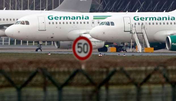 German airline Germania aircrafts are seen in parking position at Tegel airport in Berlin