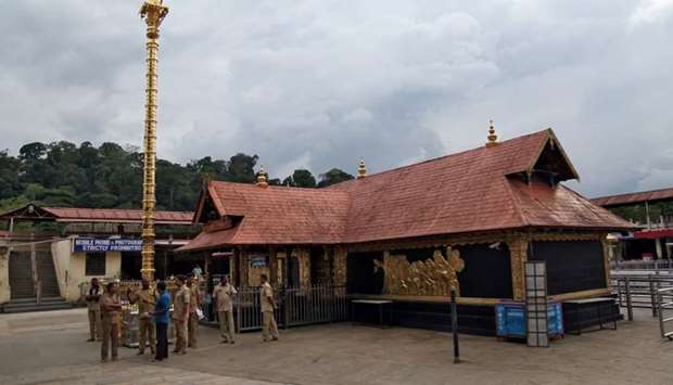 Police stand inside the premises of the Sabarimala temple in Pathanamthitta district in the southern state of Kerala, India, October 17, 2018