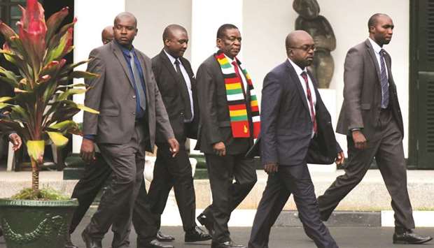 Zimbabweu2019s President Emmerson Mnangagwa arrives for talks with leaders of opposition parties in Harare yesterday.