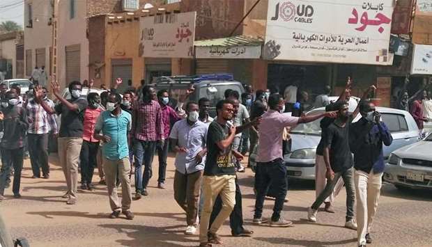 Sudanese protesters take part in an anti-government demonstration in Khartoum