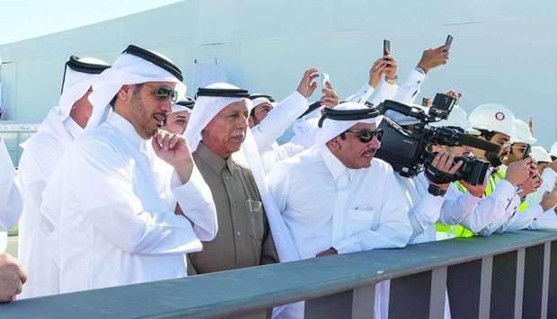HE the Prime Minister and Interior Minister Sheikh Abdullah bin Nasser bin Khalifa al-Thani and other dignitaries watch the parade.