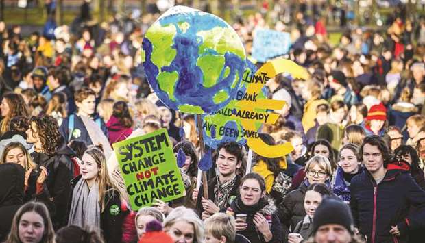 Dutch students protest in The Hague yesterday for urgent measures to combat climate change