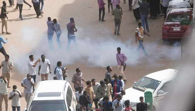 Tear gas is fired at Sudanese demonstrators during an anti-government protest in Khartoum. Reuters