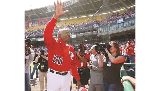 In this October 1, 2006, picture, Washington Nationals manager Frank Robinson waves to the fans on his last day as the teamu2019s manager. (Reuters)