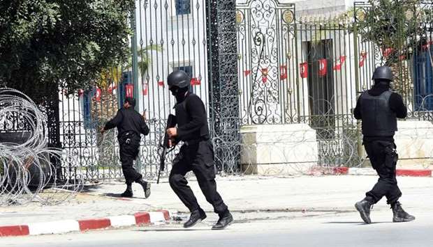 In this file photo taken on March 18, 2015, tunisian security forces secure the area after gunmen attacked Tunis' famed Bardo Museum on March 18, 2015.