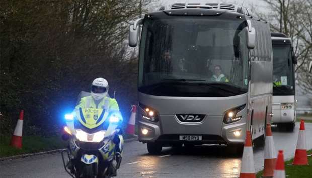 A convoy of coaches carrying British nationals evacuated from Wuhan in China amid the novel coronavirus outbreak, arrives at Kents Hill Park conference centre and hotel in Milton Keynes, north of London