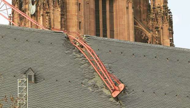 The cathedral in Frankfurt am Main, western Germany, is damaged by a construction crane which collapsed during the passage of storm Ciara.