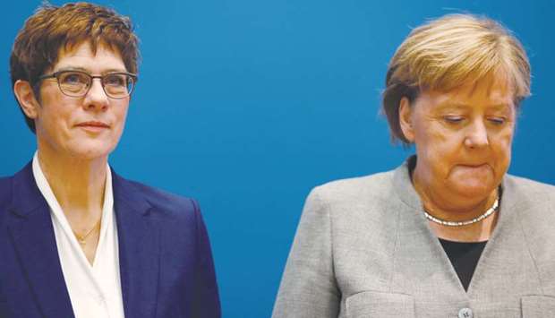 Kramp-Karrenbauer with Merkel prior to a party meeting in Berlin yesterday.