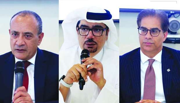 Commercial Bank Group CEO Joseph Abraham, Hussein Ali al-Abdulla, executive general manager and chief marketing officer and Commercial Bank chief financial officer and executive general manager Rehan Khan. PICTURE: Anas al-Samaraee.
