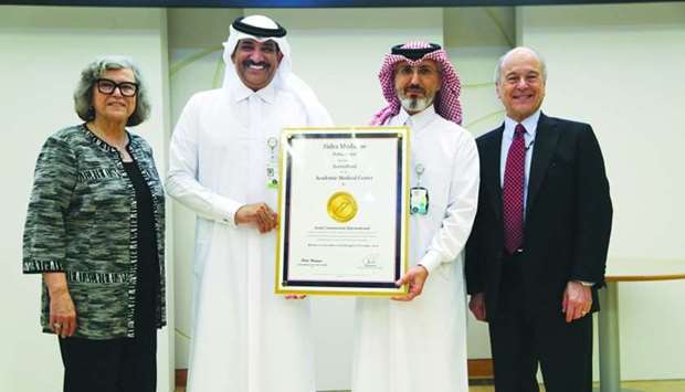 Dr Abdulla al-Kaabi and Mohamed K al-Mana receiving the official JCI certificate. President and CEO of the Joint Commission Dr Mark R Chassin, President and Chief Executive Officer of Joint Commission Resources Paula Wilson officially presented the JCI Gold Seal of Approval to Sidra Medicine at a ceremony on February 10.