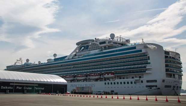 The Diamond Princess cruise ship, with around 3,600 people quarantined onboard due to fears of the deadly coronavius, is seen anchored at the Daikaku Pier Cruise Terminal in Yokohama