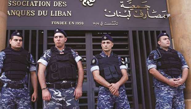 Lebanese police stand outside the entrance to the Association of Banks in downtown Beirut (file).
