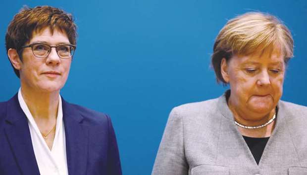 Kramp-Karrenbauer with Merkel prior to a party meeting in Berlin.
