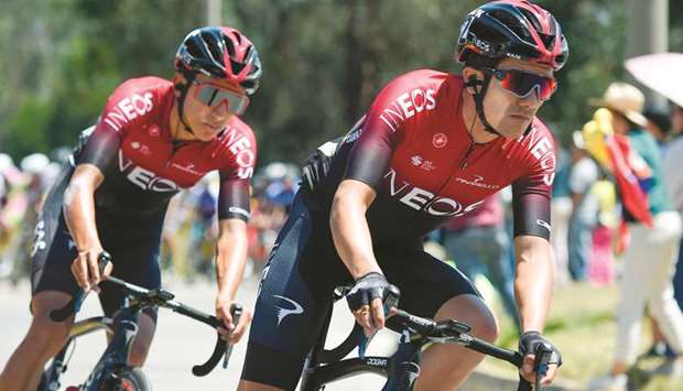 Colombiau2019s Egan Bernal (left) and Ecuadorian Richard Carapaz of Great Britainu2019s Ineos team race during the second stage of the Tour Colombia 2.1, in Colombia, on Wednesday. (AFP)