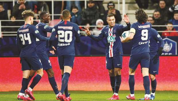 Paris St. Germainu2019s Kylian Mbappe celebrates their fifth goal with teammates in their French Cup quarter-final against Dijon. (Reuters)