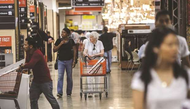 Customers shop at a Home Depot store in New York. Data for December was revised down to show the so-called core retail sales rising 0.2% instead of jumping 0.5% as previously reported.