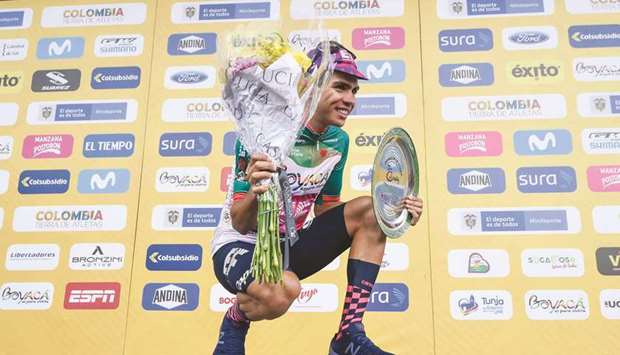 Colombiau2019s Sergio Higuita of EF Pro Cycling team celebrates with the points leader green shirt after winning the fourth stage of the Tour Colombia 2.1, in Santa Rosa de Vitierbo, Boyaca Department, Colombia, on Friday. (AFP)